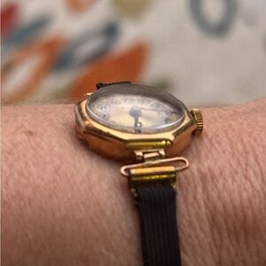 Gold Analog Watch with Black Strap